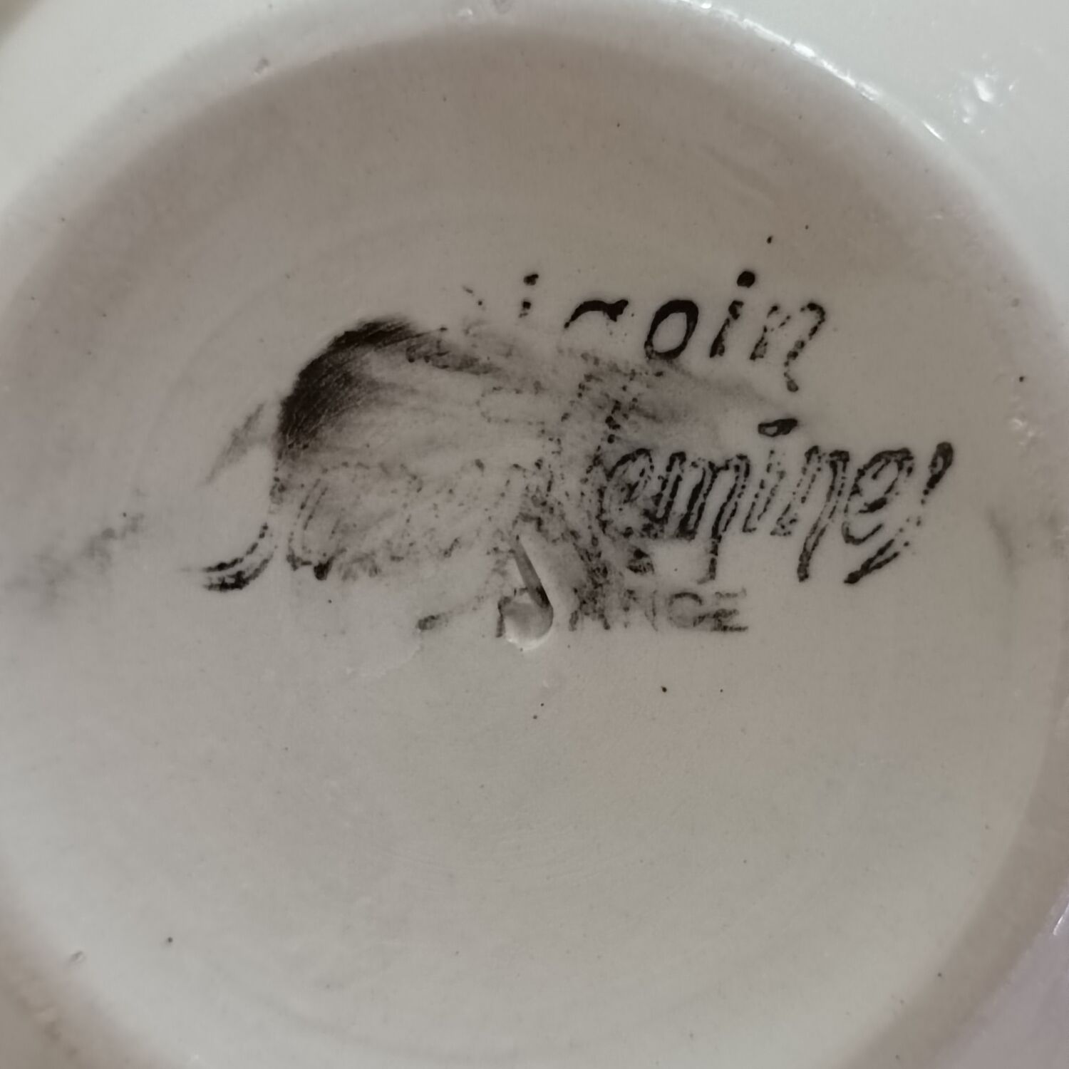 Two ivory cups and saucers from Sarreguemines