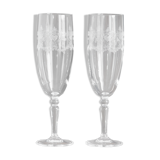 2 crystal champagne flutes of engraved arches