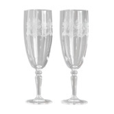 2 crystal champagne flutes of engraved arches