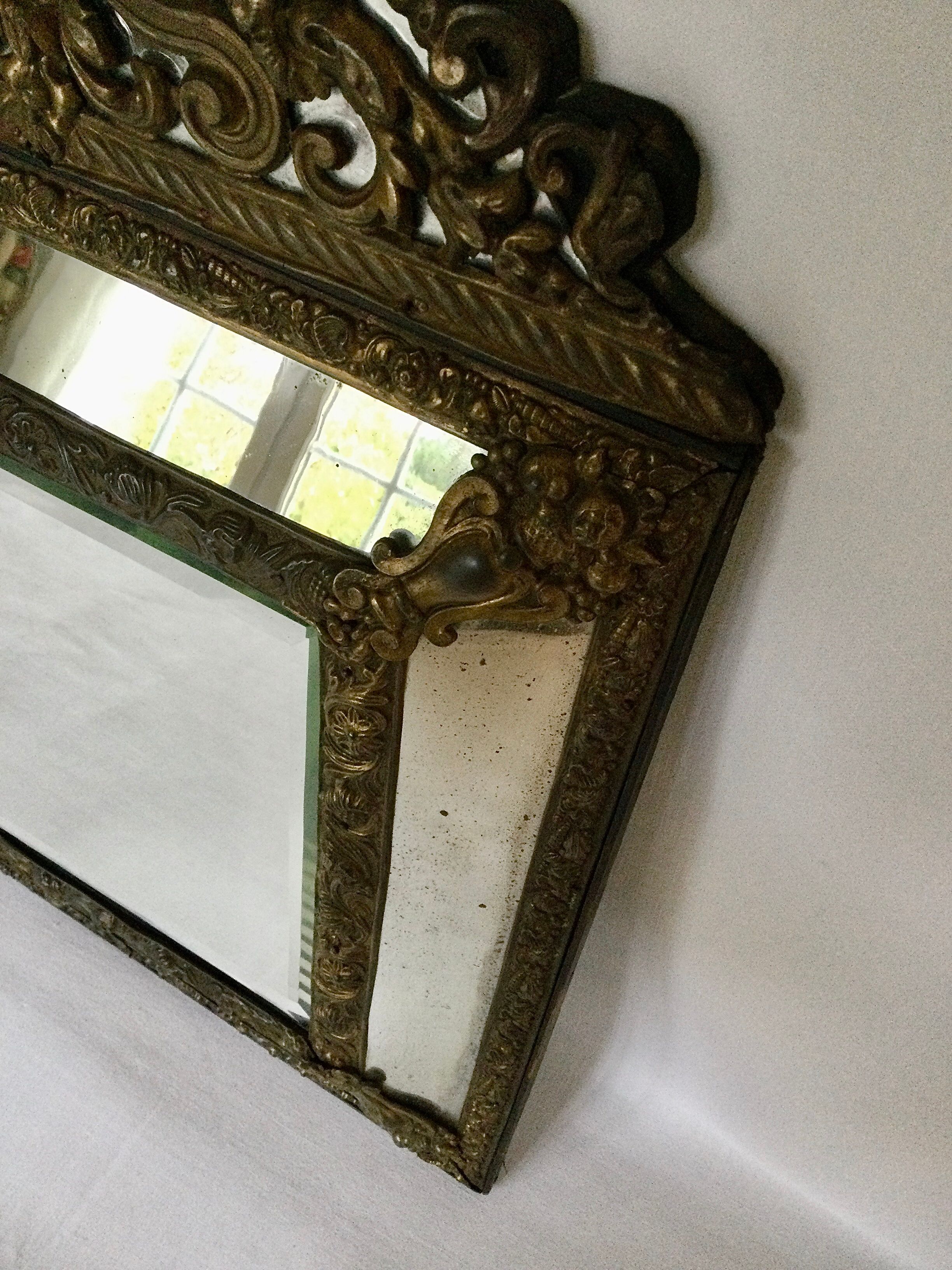 19th century embossed brass mirror with bead - 65x39cm