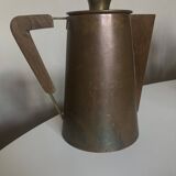 Modernist Italian pitcher design from the 1960s in patinated wood and metal.