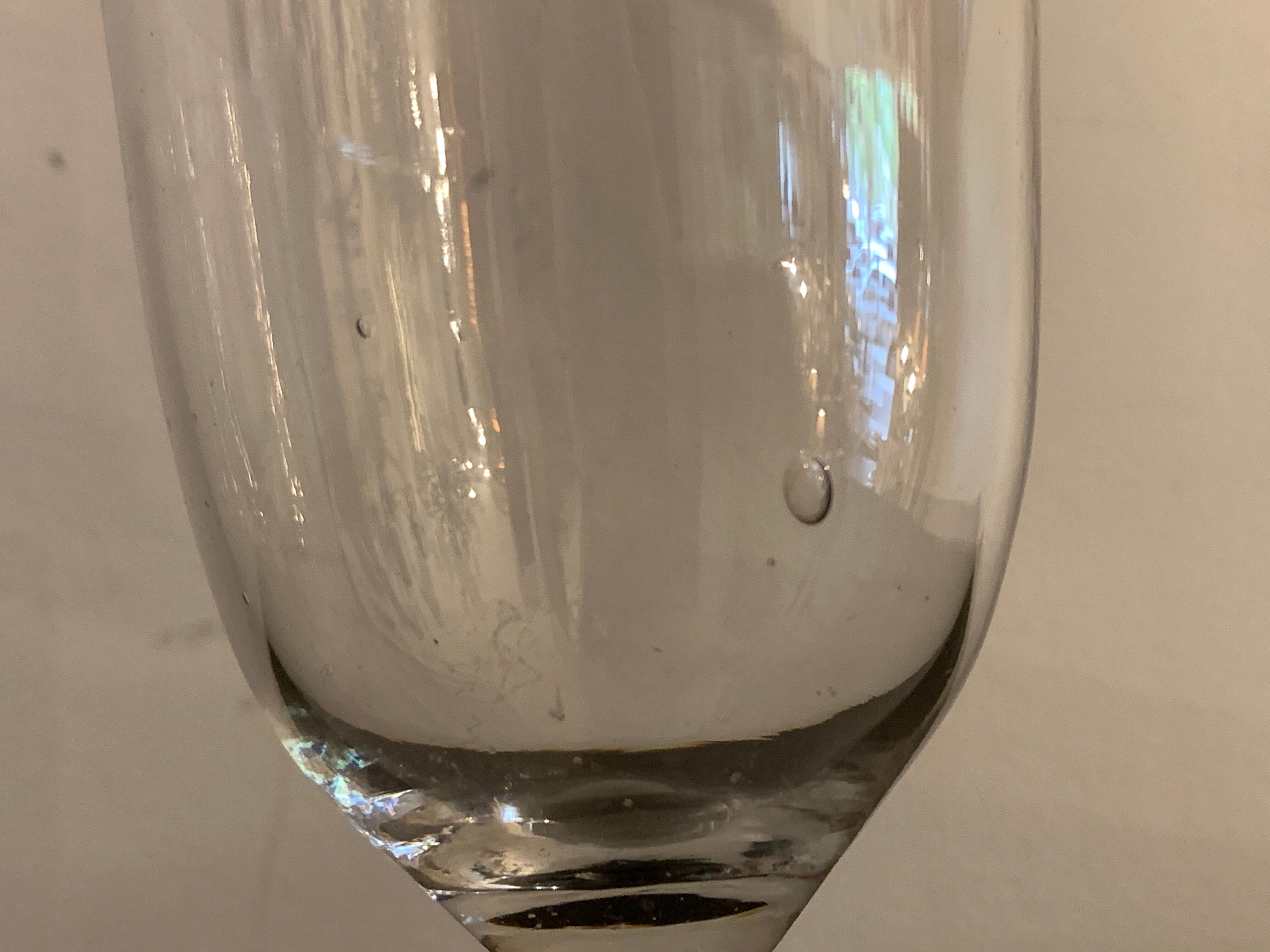 7 antique blown foot glasses