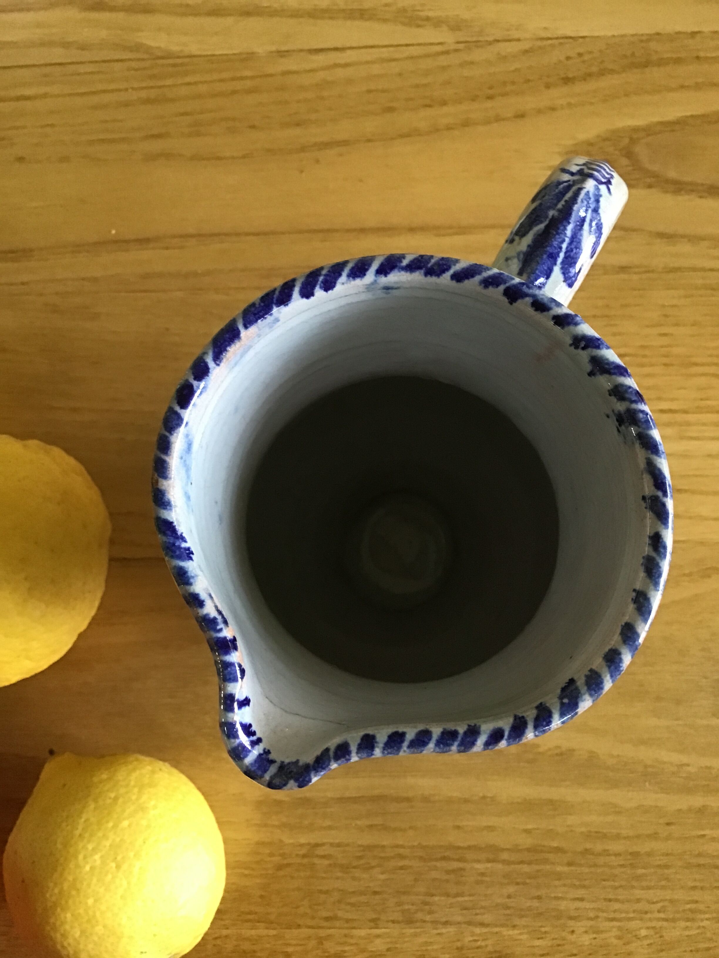 Earthenware pitcher with blue decor