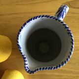 Earthenware pitcher with blue decor
