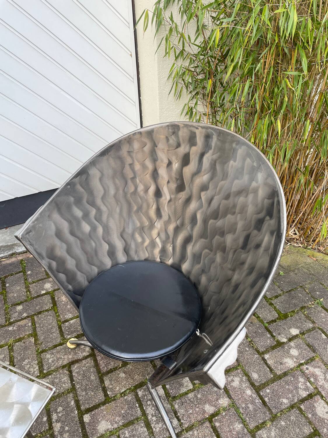 2 cone chairs and a table by Steel-Line