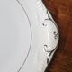 Silver-edged dessert service and its dish