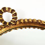Round wall mirror in gilded wood, mid-century, C. Allodi & G. Subelli, Italy, 1950s.