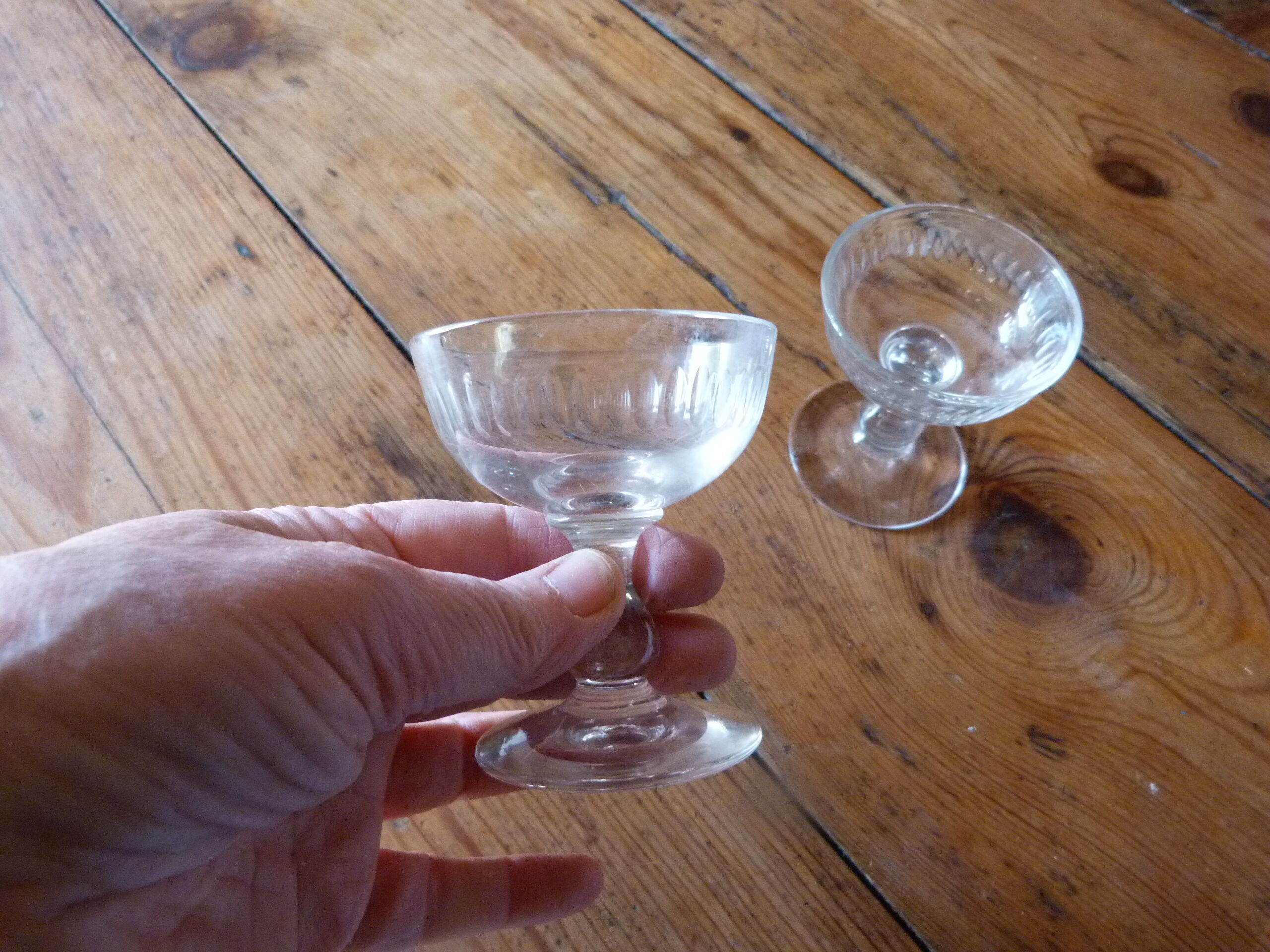 Set of 2 old foot glasses for liqueur