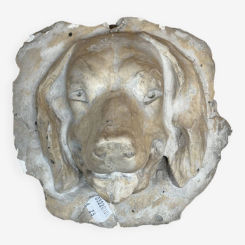 Plaster dog sculpture