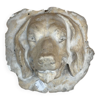 Plaster dog sculpture