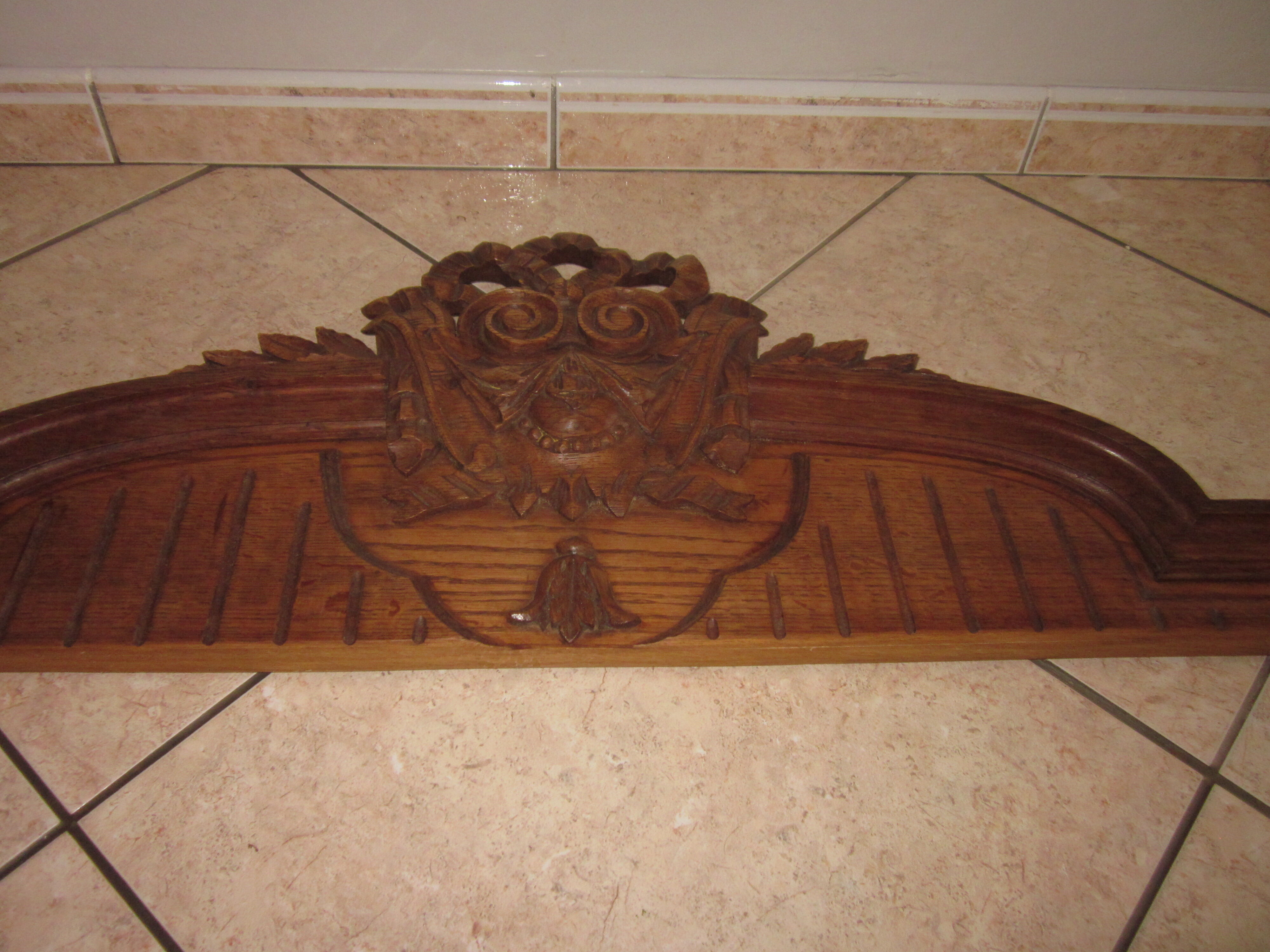 Ancient pediment in oak