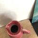 Pink ceramic pitcher
