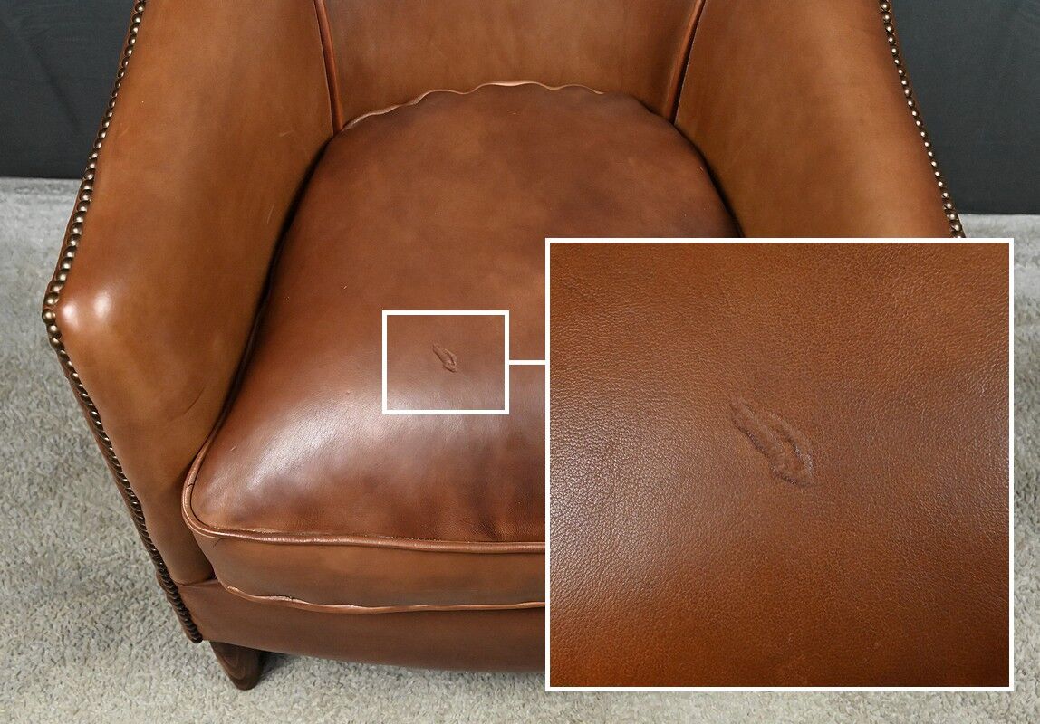 Solange club armchair in sheepskin leather.