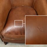 Solange club armchair in sheepskin leather.