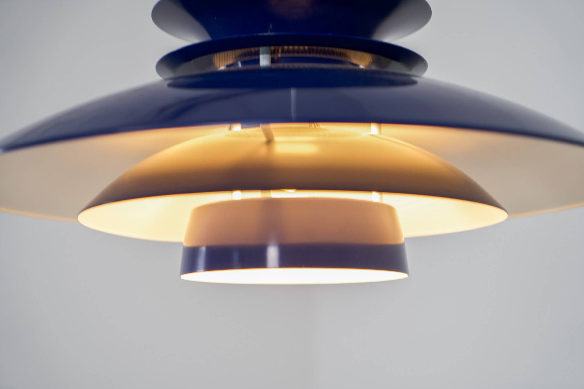 Elegant blue pendant light by Belux