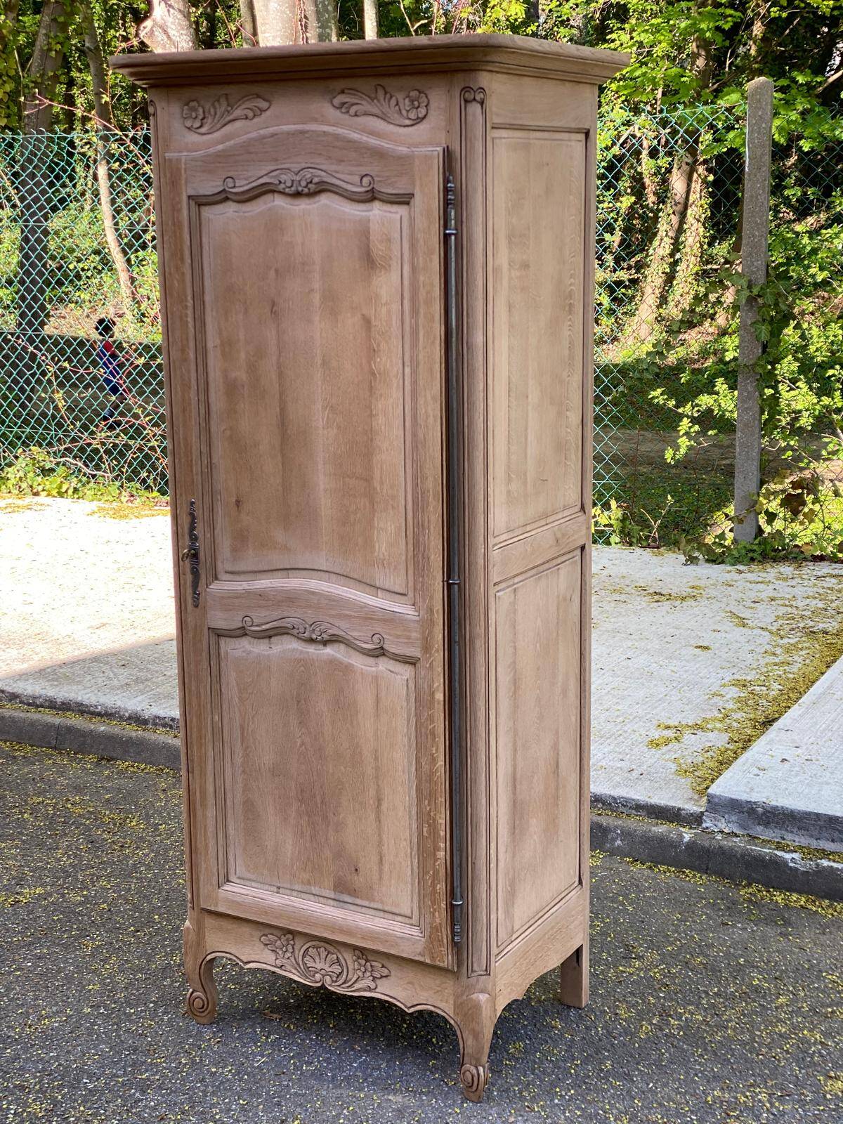 Renovated Louis XV bonnetière dormitory wardrobe in solid oak.