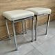 Pair of vintage 1980 chrome stools with white faux leather in very good condition.