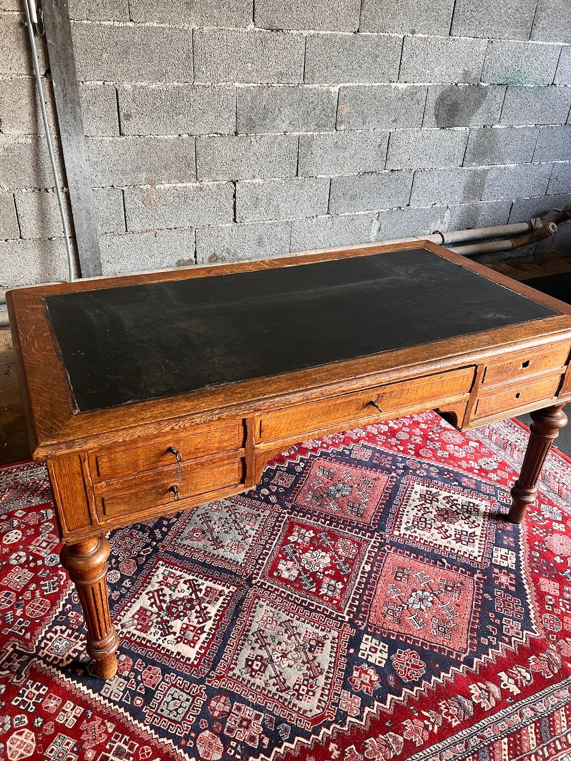 Louis Philippe antique desk with leather-wrapped top