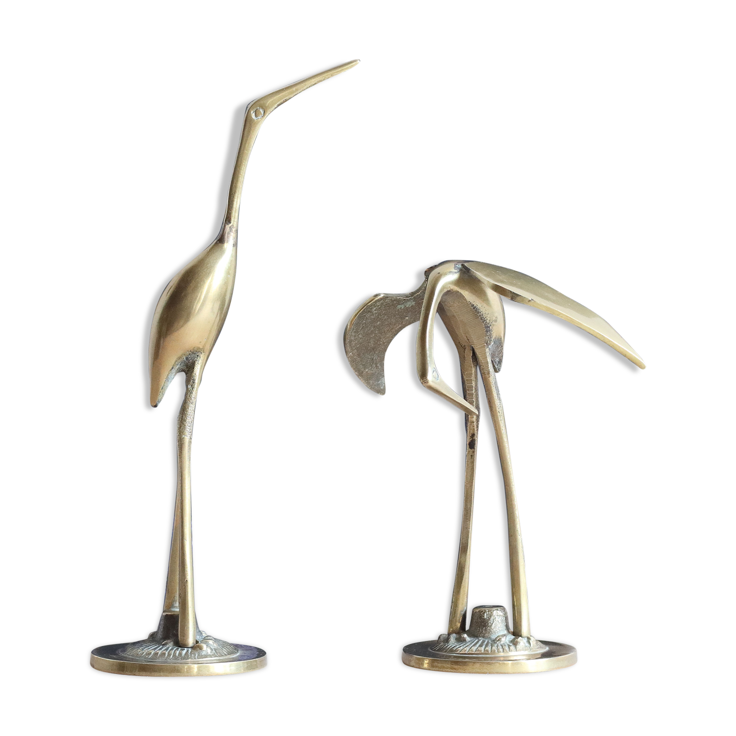 Couple of herons, golden brass