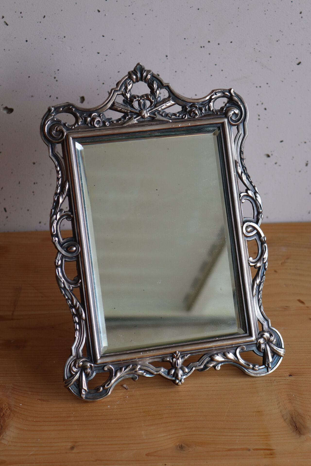 Small antique table mirror in Louis XVI style, silver-plated metal.