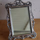 Small antique table mirror in Louis XVI style, silver-plated metal.