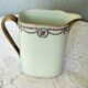 Porcelain milk pot limoges blanche liseret beak and handle dores and garland pink
