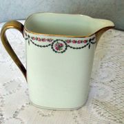 Porcelain milk pot limoges blanche liseret beak and handle dores and garland pink