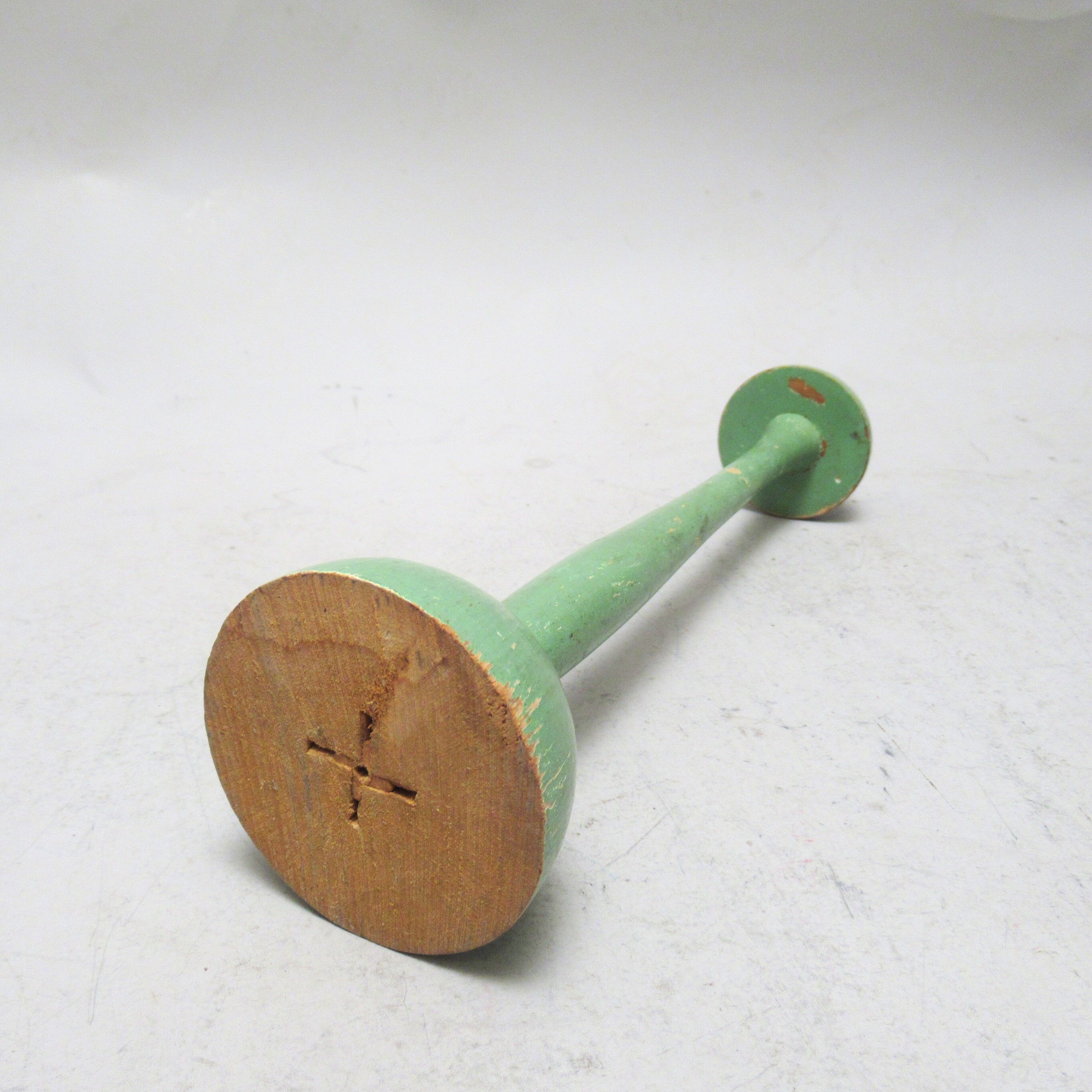 Green wooden hat holder
