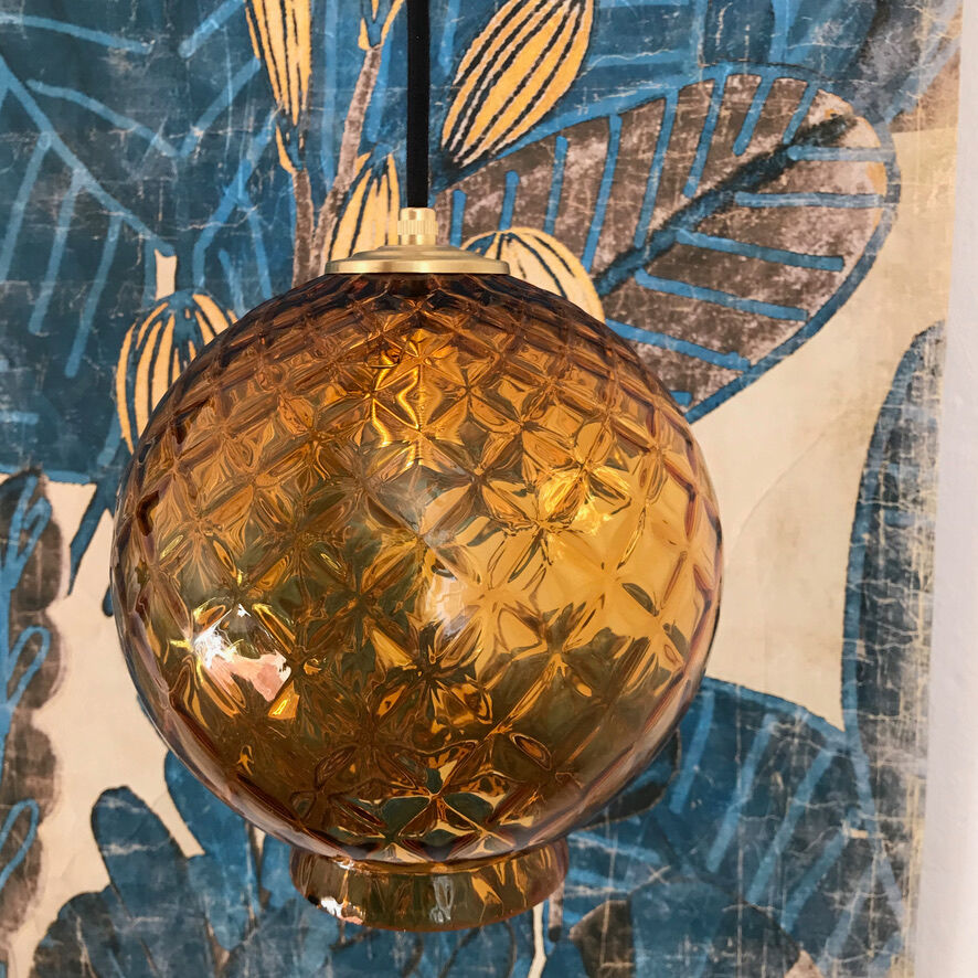 Amber glass globe suspension