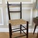 Chaise vintage en bois et paille tressée