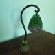 Lampe à poser, pied en fonte et abat jour en perles années 60