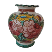 signed vase has floral decoration