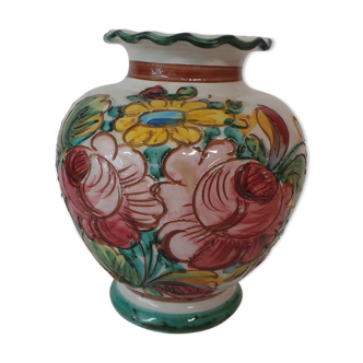 signed vase has floral decoration