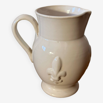Old white ceramic pitcher with fleur de lys in relief h 14 cm