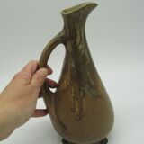 Denbac pitcher mounts lion paws