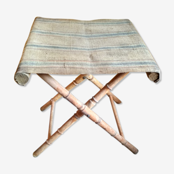 Faux bamboo folding stool and rustic striped canvas