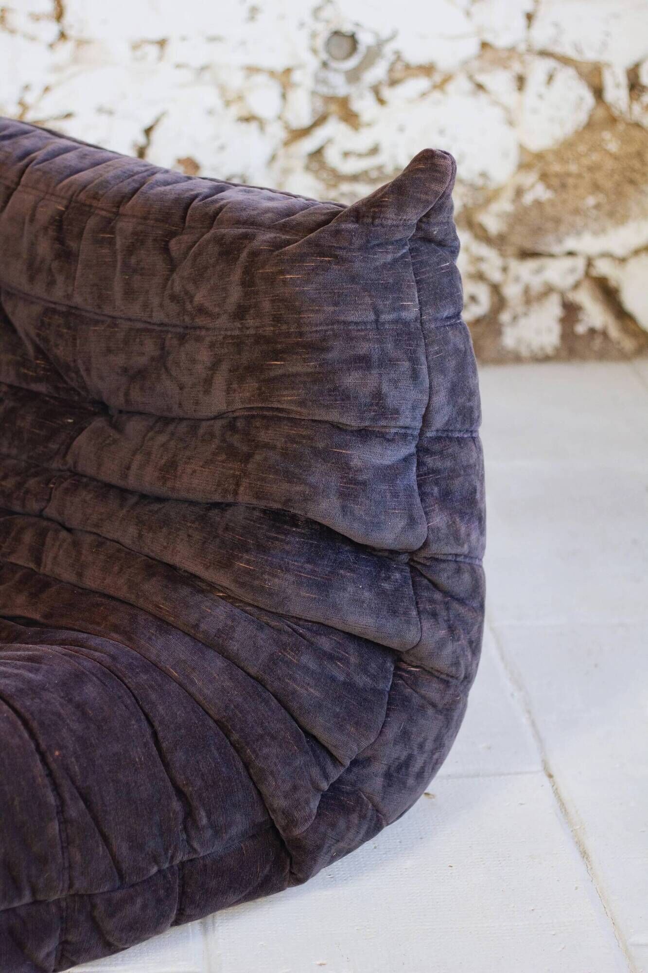 Togo aubergine corner armchair by Michel Ducaroy for Ligne Roset