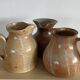 Trio of vintage stoneware jug vases