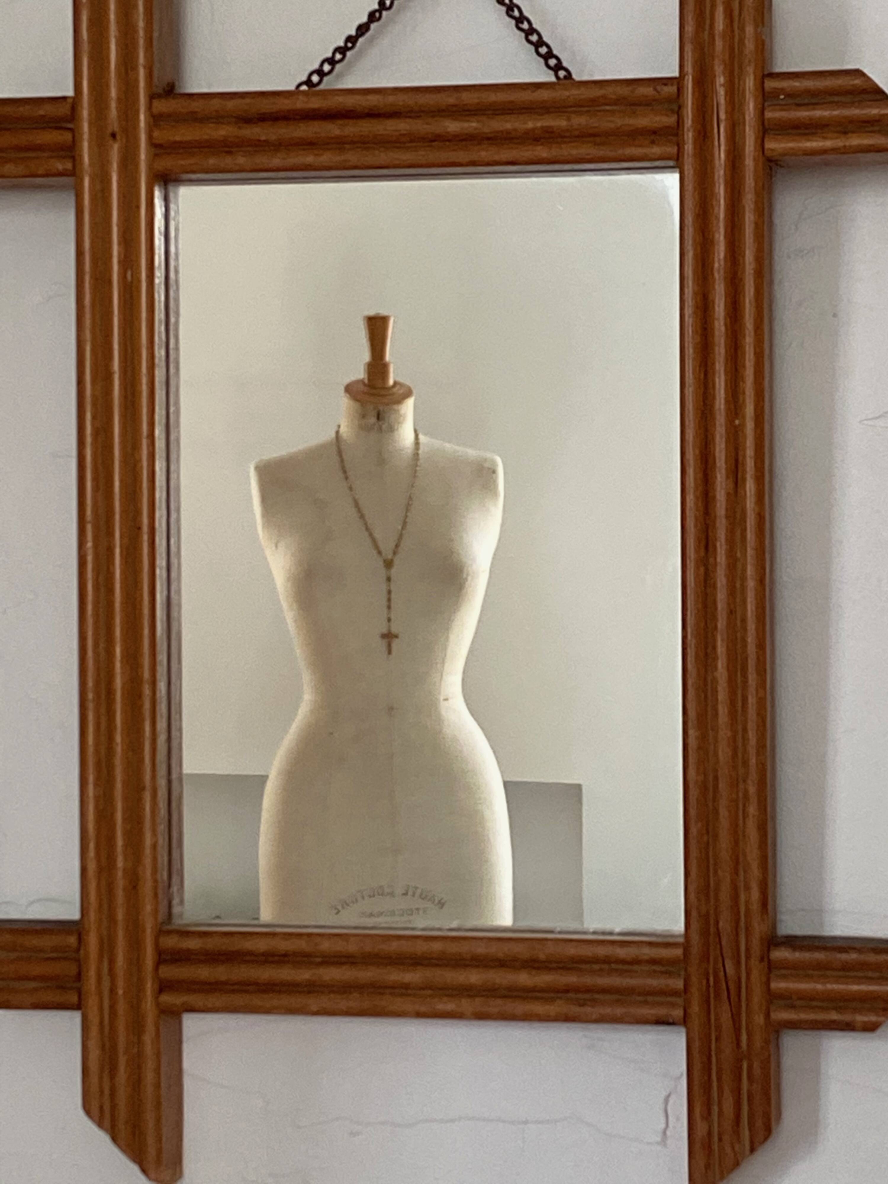 Blonde wooden barber mirror