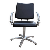 Futuristic 90s style hairdresser's chair