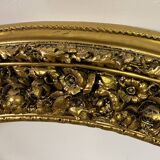 Large format golden oval frame