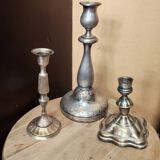 Set of three silver candle holders