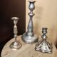 Set of three silver candle holders
