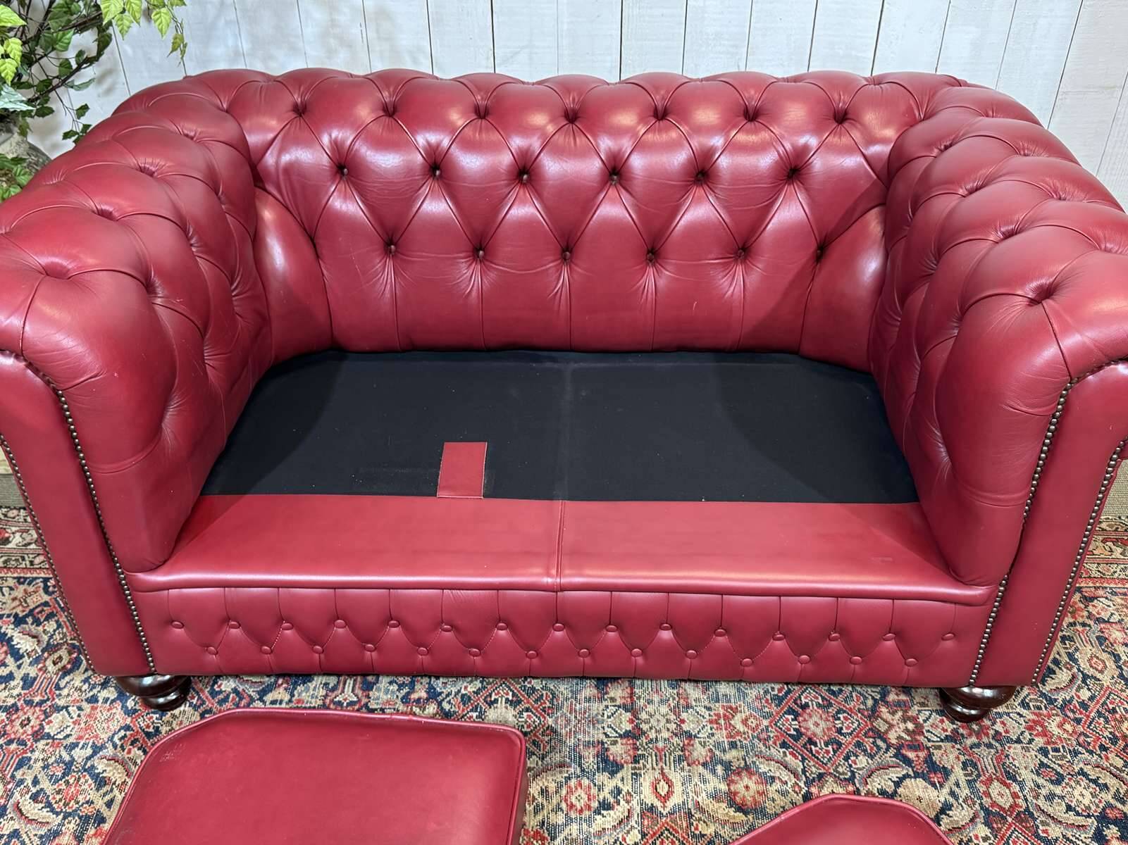 Chesterfield 2-seater leather sofa, modern production from the 2000s.