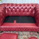Chesterfield 2-seater leather sofa, modern production from the 2000s.