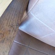 Scandinavian brown skai and wood armchair