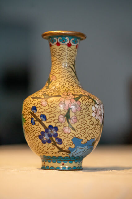 Asian vase decorated with cherry trees