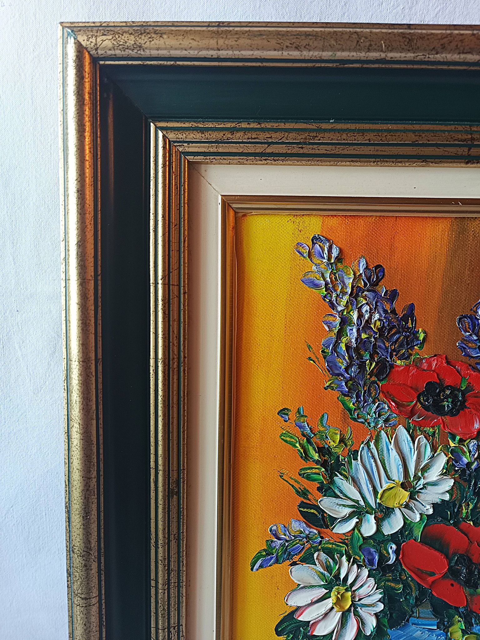 Oil painting on canvas, bouquet of flowers in a framed vase, signed.