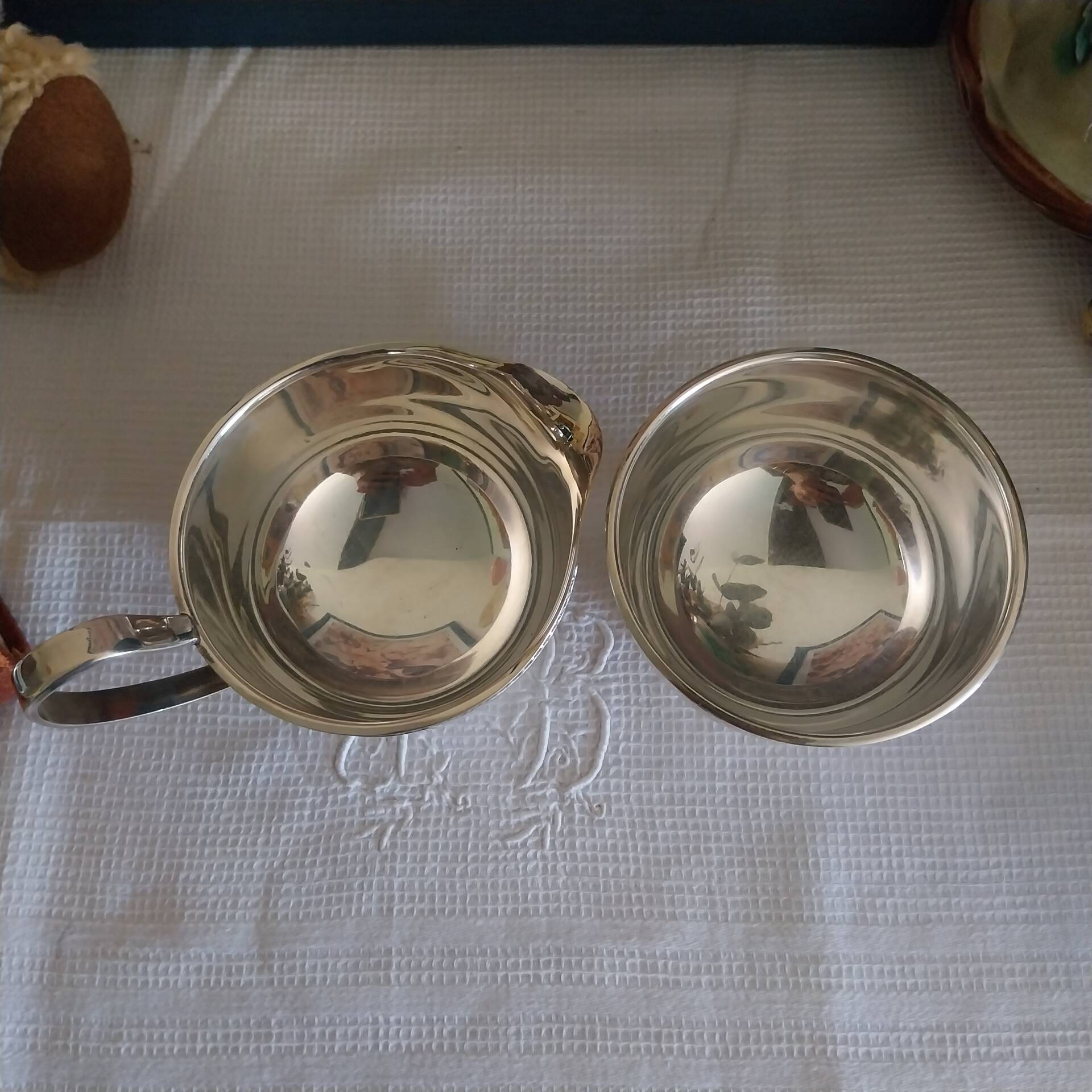 Vintage silver-plated sugar bowl and cream jug by Viners of Sheffield.