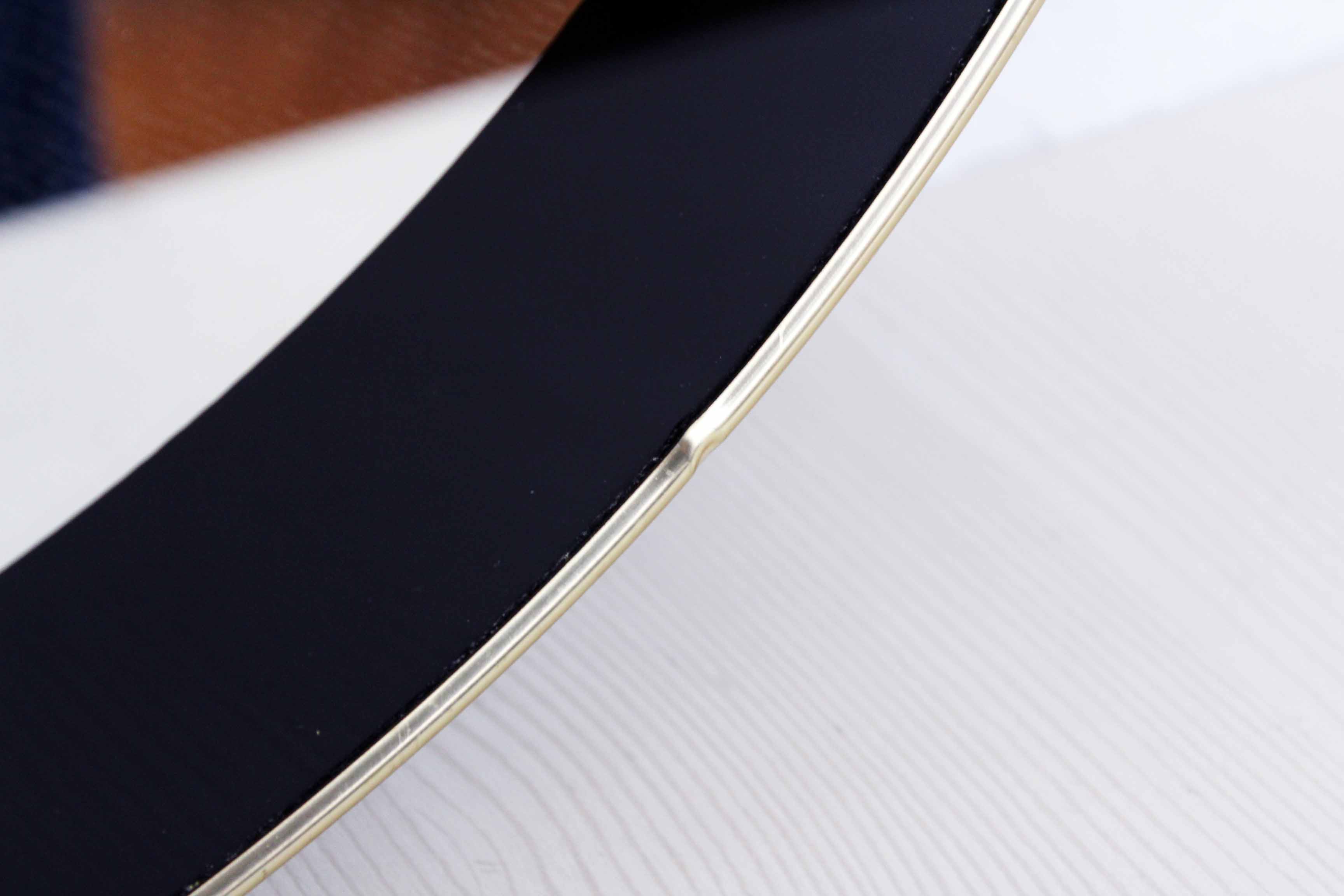 Black and gold 60s round mirror